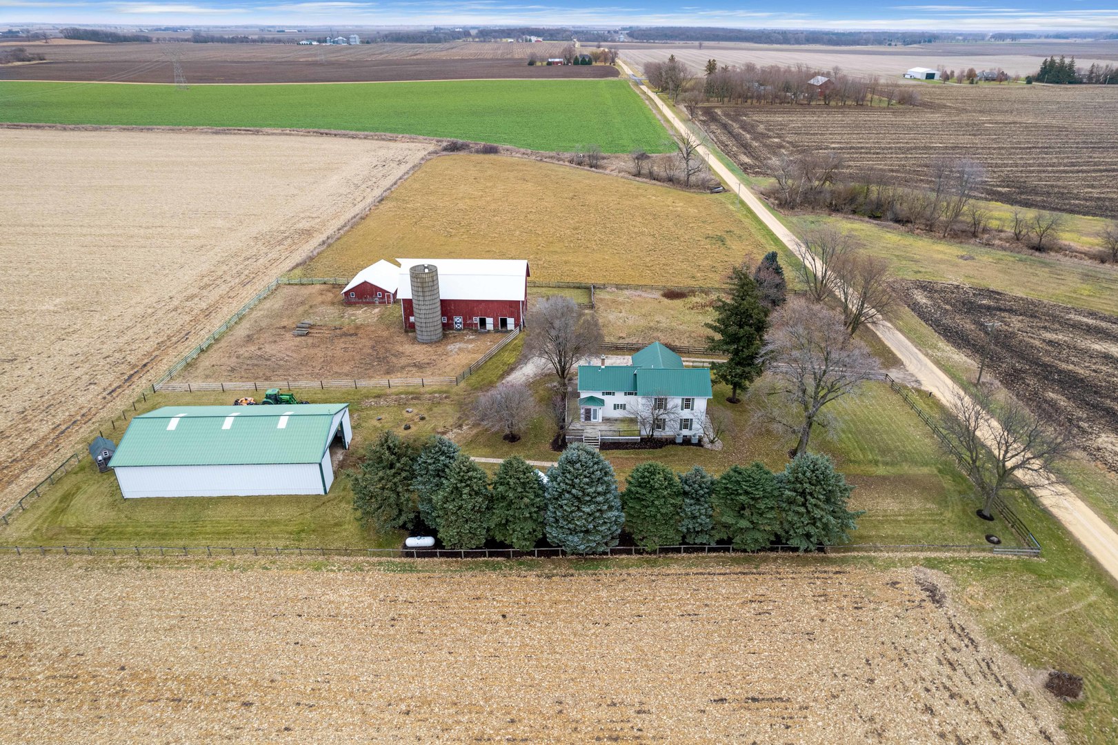 16645 Lasher Road Hinckley, IL 60520 - Photo 68 of 80 an aerial view of a house with a yard and ocean