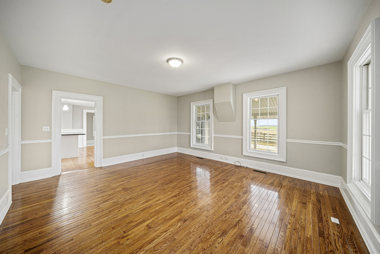 16645 Lasher Road Hinckley, IL 60520 - Photo 7 of 80 wooden floor in an empty room with a window