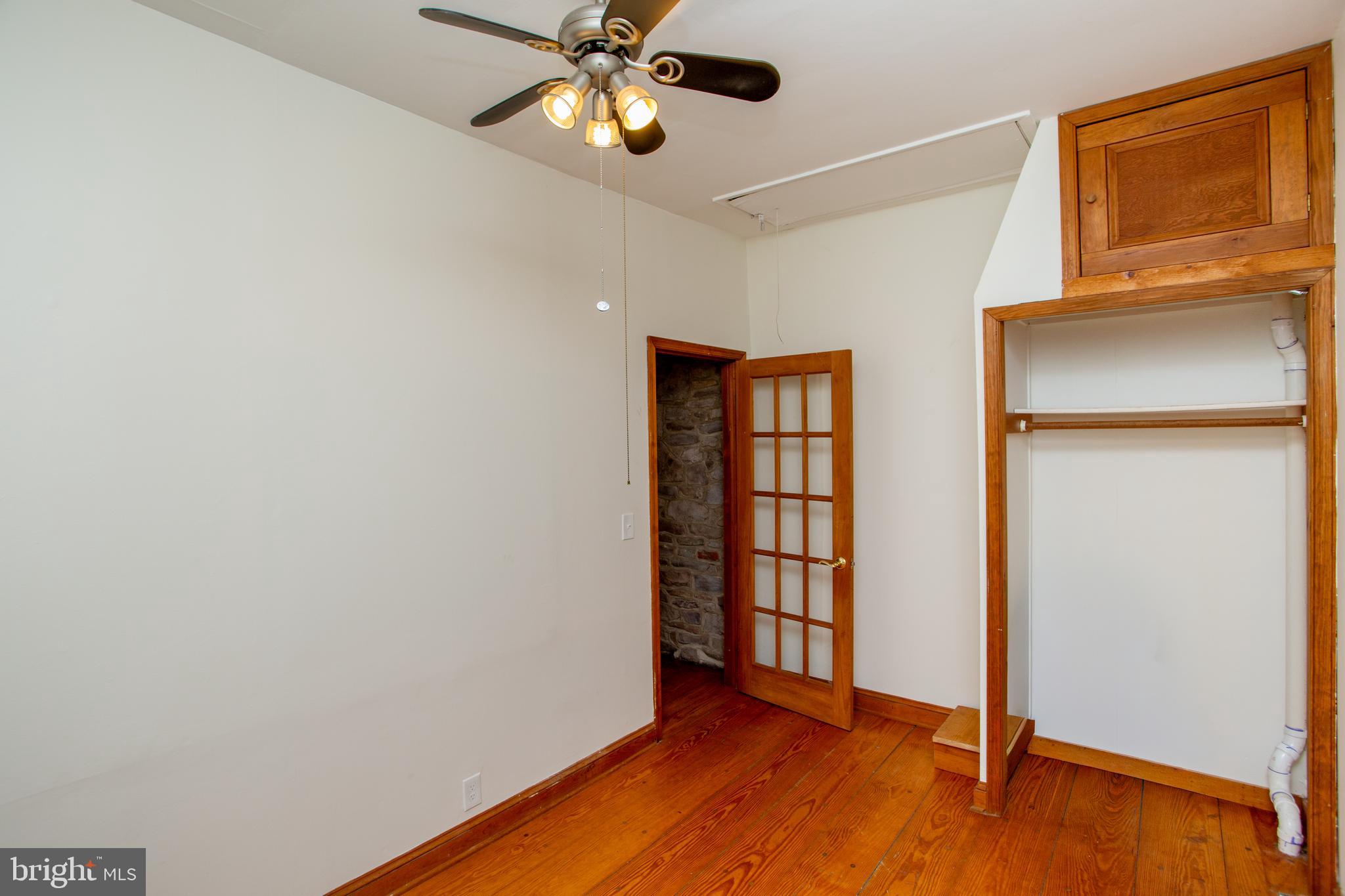 6 Quarry Road Stockton, NJ 08559 - Photo 21 of 34 Bedroom 2 with french door, wood floor