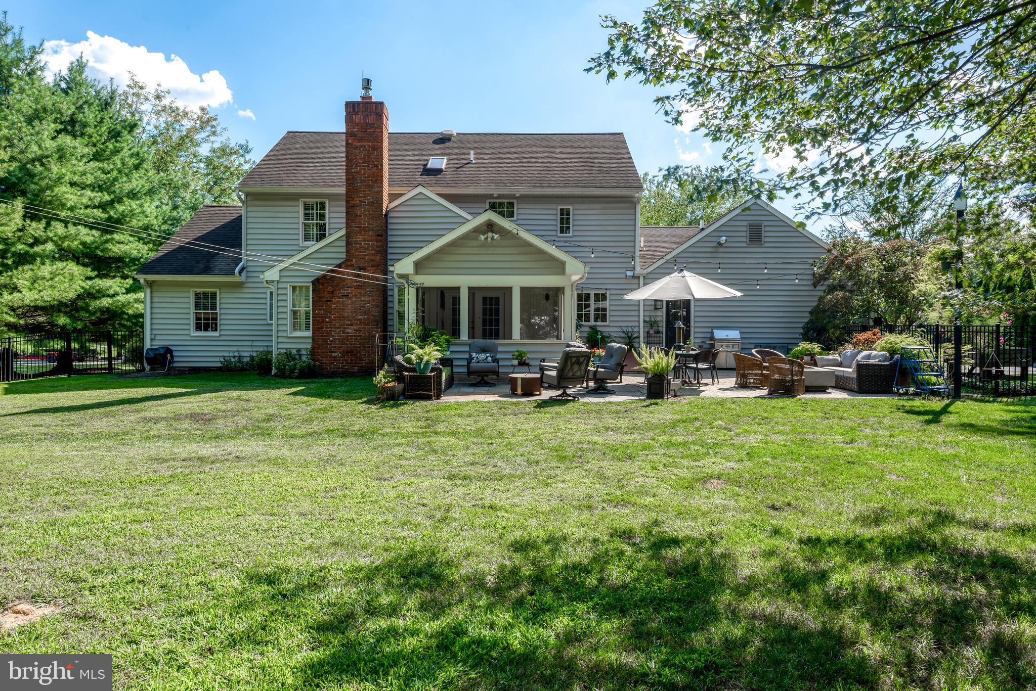 1325 Olde Saybrook Road Lancaster, PA 17601 - Photo 71 of 80 a front view of a house with a garden and trees