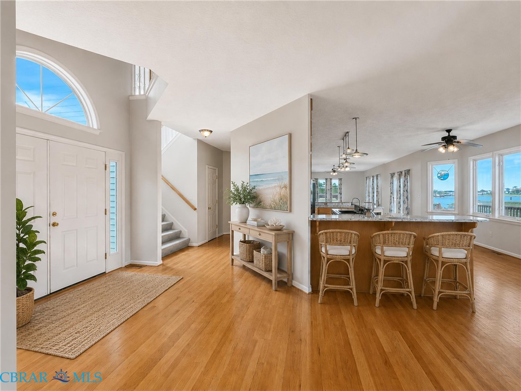 1214 Dandy Loop Road Yorktown, VA 23692 - Photo 17 of 65 a dining room with furniture and wooden floor