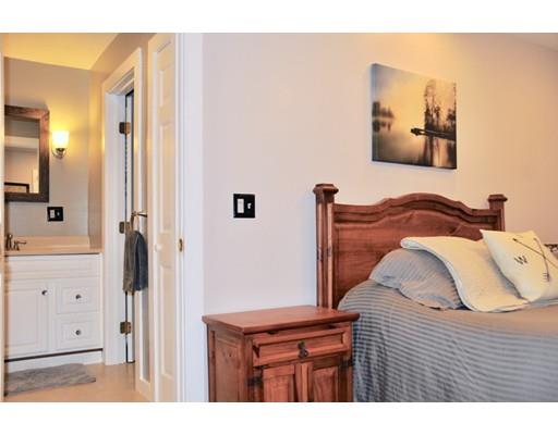 10 Collette Road Sturbridge, MA 01518 - Photo 14 of 30 a bedroom with a bed and a mirror