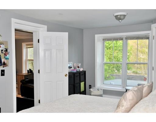 10 Collette Road Sturbridge, MA 01518 - Photo 20 of 30 a living room with a bed furniture and a window