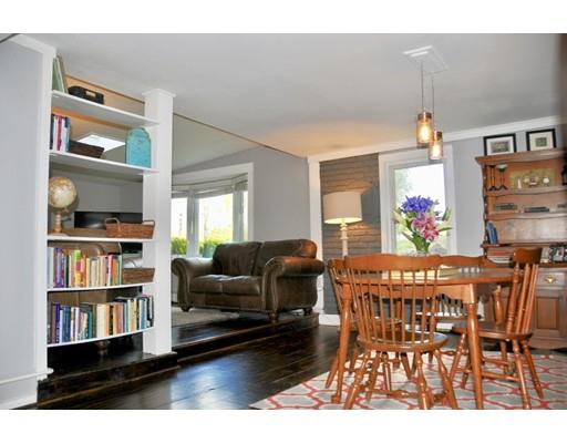 10 Collette Road Sturbridge, MA 01518 - Photo 3 of 30 a living room with furniture and a book shelf