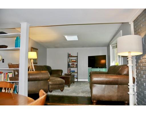 10 Collette Road Sturbridge, MA 01518 - Photo 4 of 30 a living room with furniture and a flat screen tv