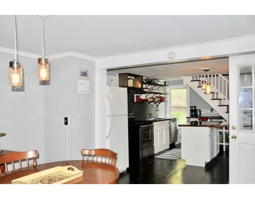 10 Collette Road Sturbridge, MA 01518 - Photo 7 of 30 a kitchen with stainless steel appliances kitchen island granite countertop a refrigerator and a stove