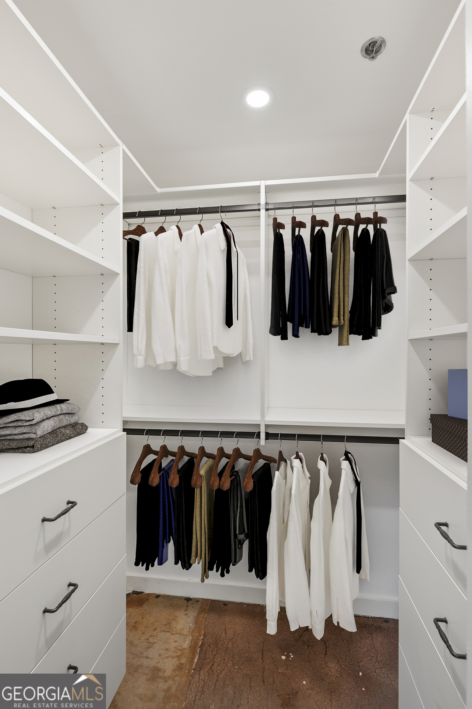 585 White Circle, Unit 509 Athens, GA 30605 - Photo 24 of 42 a view of walk in closet with clothes and shoes