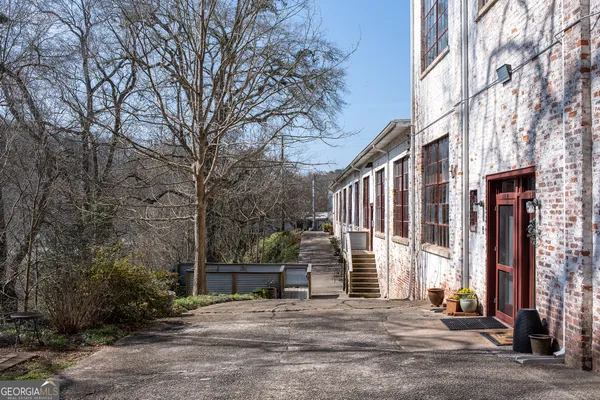 a view of a backyard of the house
