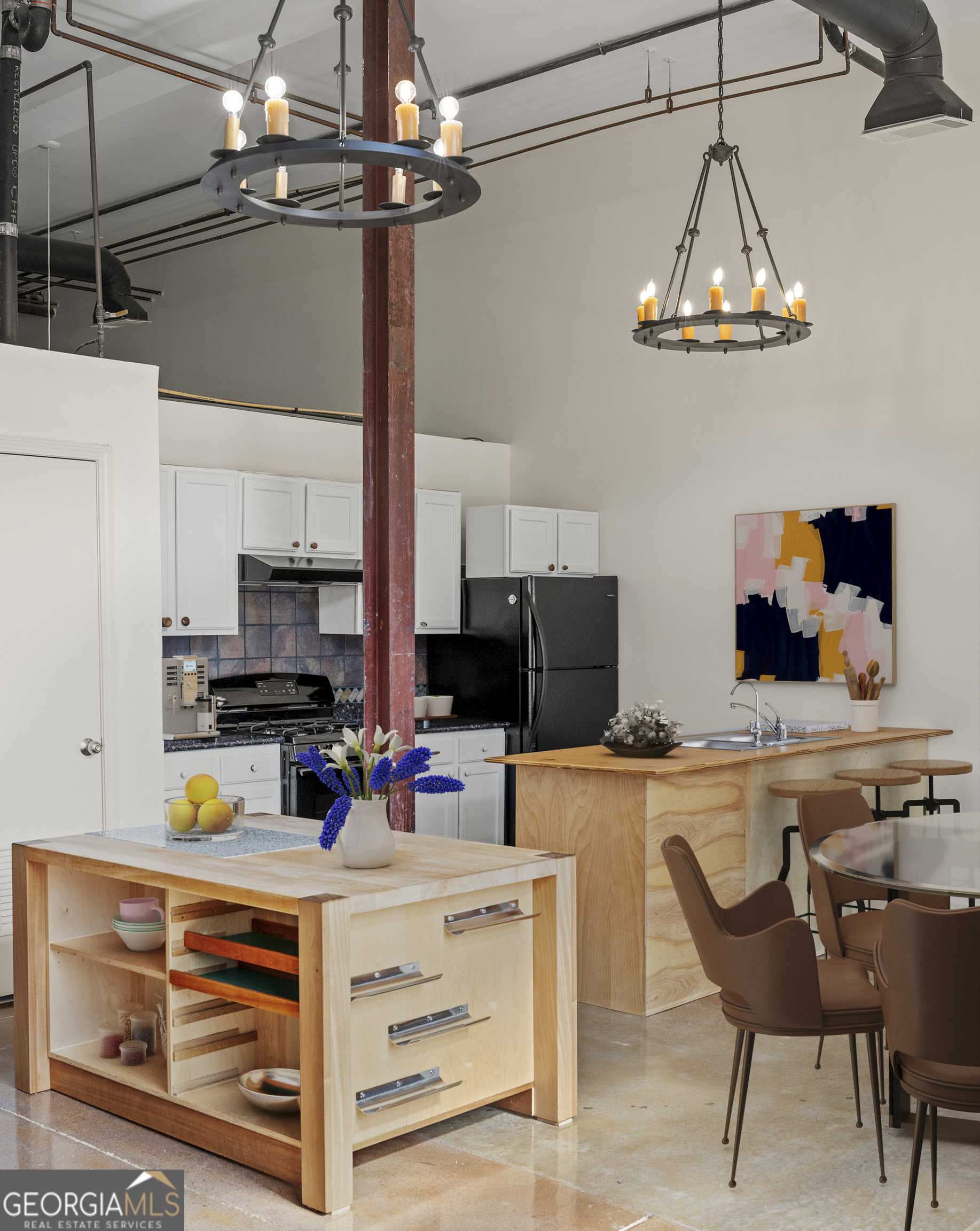 585 White Circle, Unit 509 Athens, GA 30605 - Photo 7 of 42 a kitchen with a cabinets a counter space and stainless steel appliances