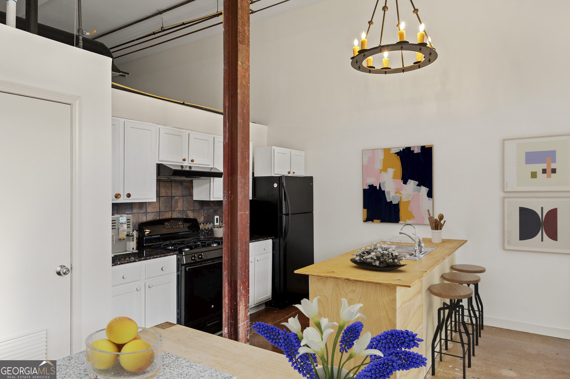 585 White Circle, Unit 509 Athens, GA 30605 - Photo 8 of 42 a kitchen with stainless steel appliances a stove a refrigerator and a dining table