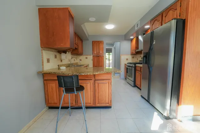 $565,000 | 1308 Merrywood Drive, Edison, NJ 08817