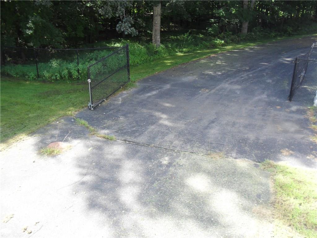 543 Prescott Road Manchester, ME 04351 - Photo 34 of 35 Even the back driveway is fenced.