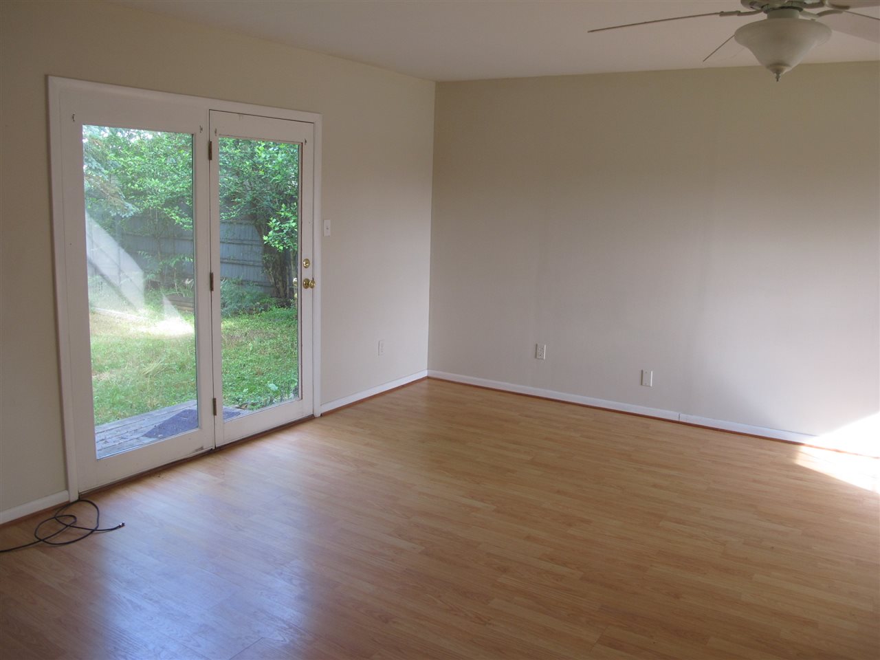 84 Lake View Court Ruckersville, VA 22968 - Photo 4 of 15 a view of an empty room with wooden floor and a window