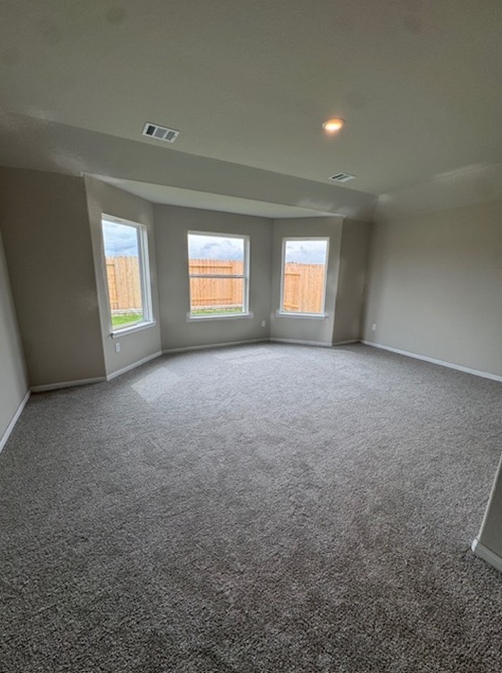 13626 Kit Run Splendora, TX 77372 - Photo 5 of 43 an empty room with windows