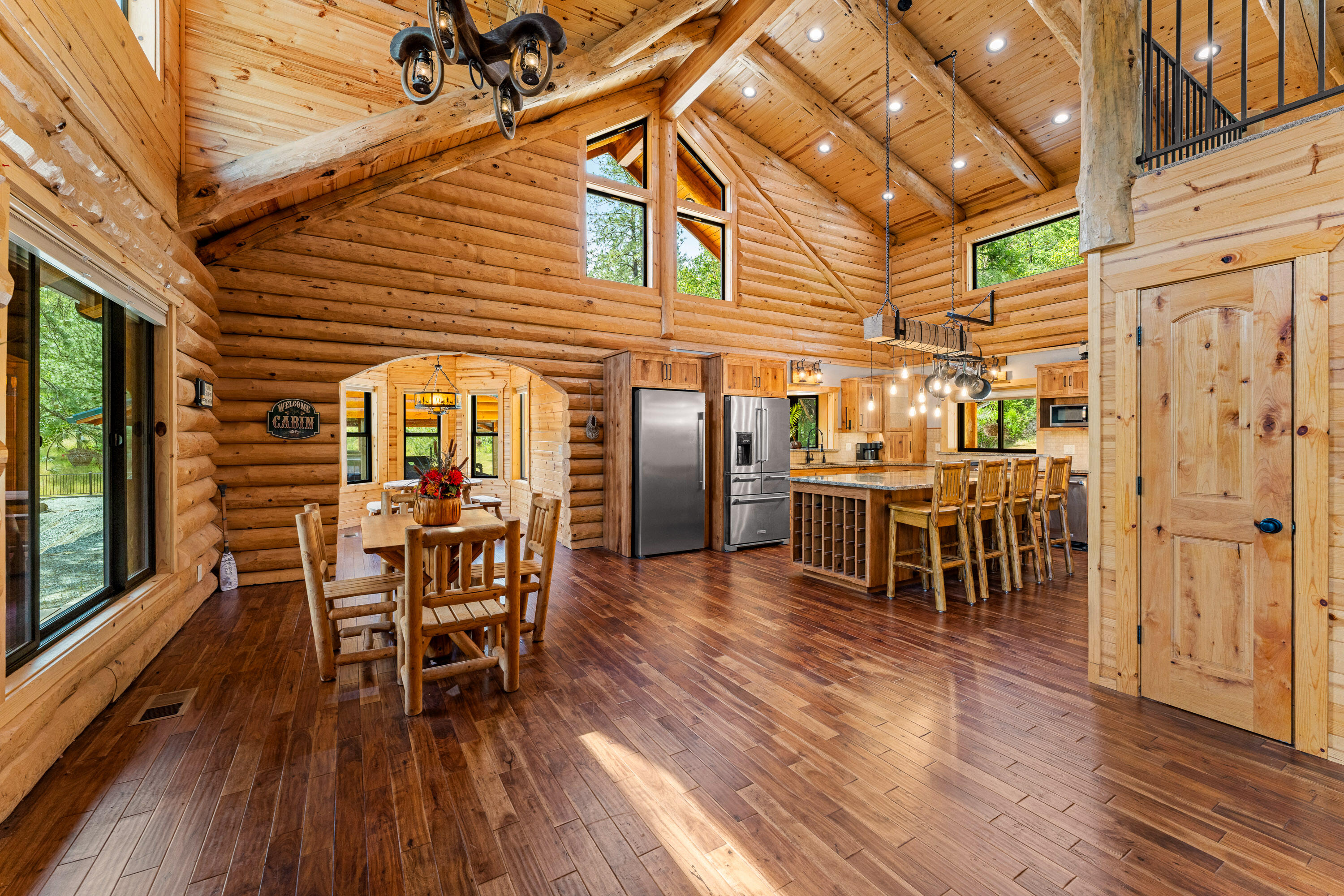225 Eagle Ridge Road Canyonville, OR 97417 - Photo 37 of 52 a dining room with furniture and wooden floor
