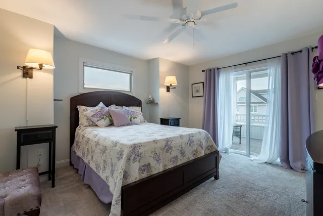 a bed room with a bed and a window