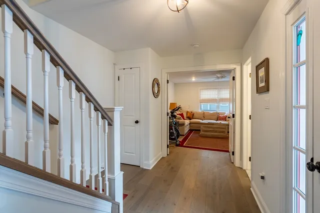 a view of a hallway view with staircase