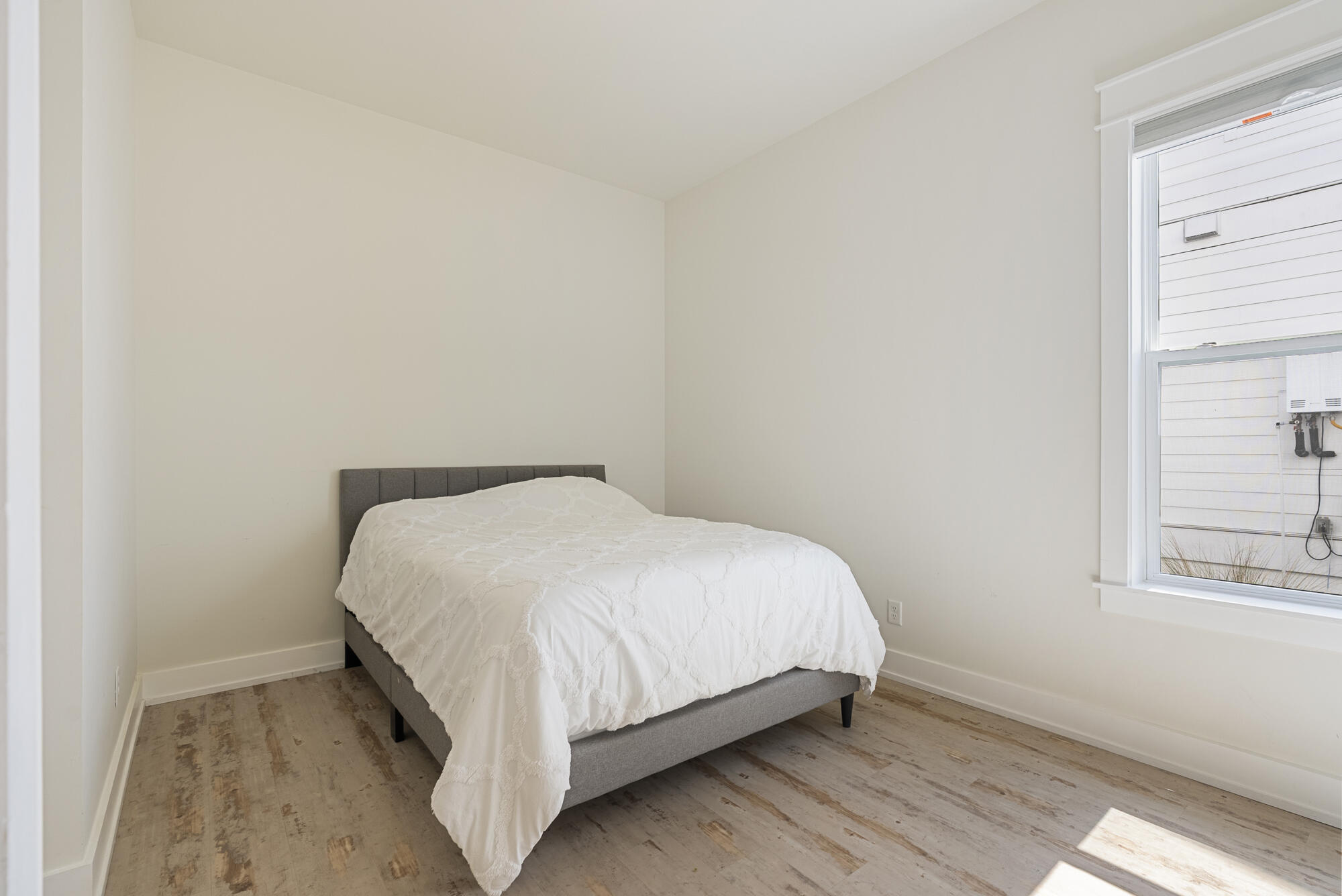 79 Beach View Drive Inlet Beach, FL 32461 - Photo 13 of 41 a bed sitting in a bedroom next to a window