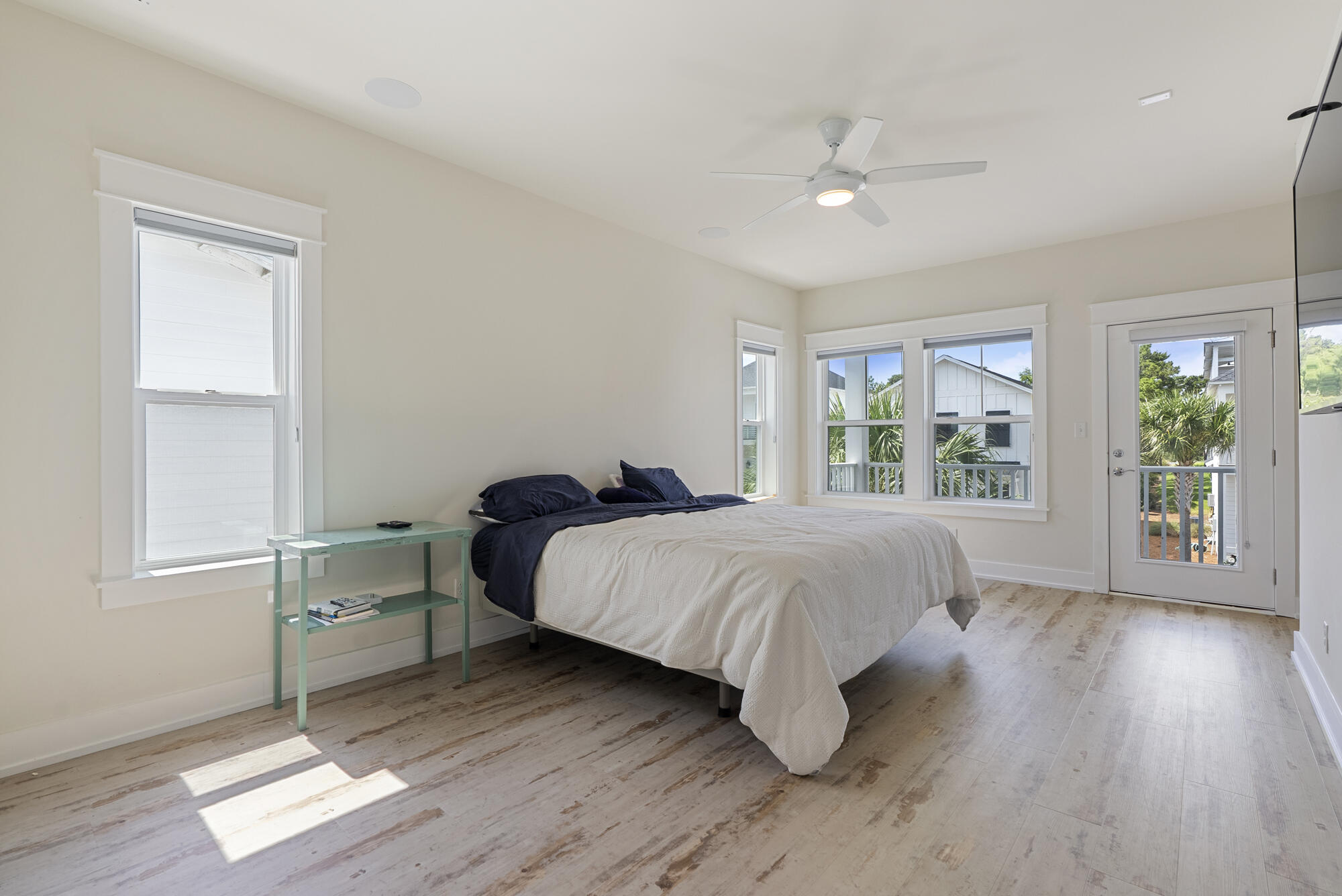 79 Beach View Drive Inlet Beach, FL 32461 - Photo 18 of 41 a spacious bedroom with a bed and wooden floor