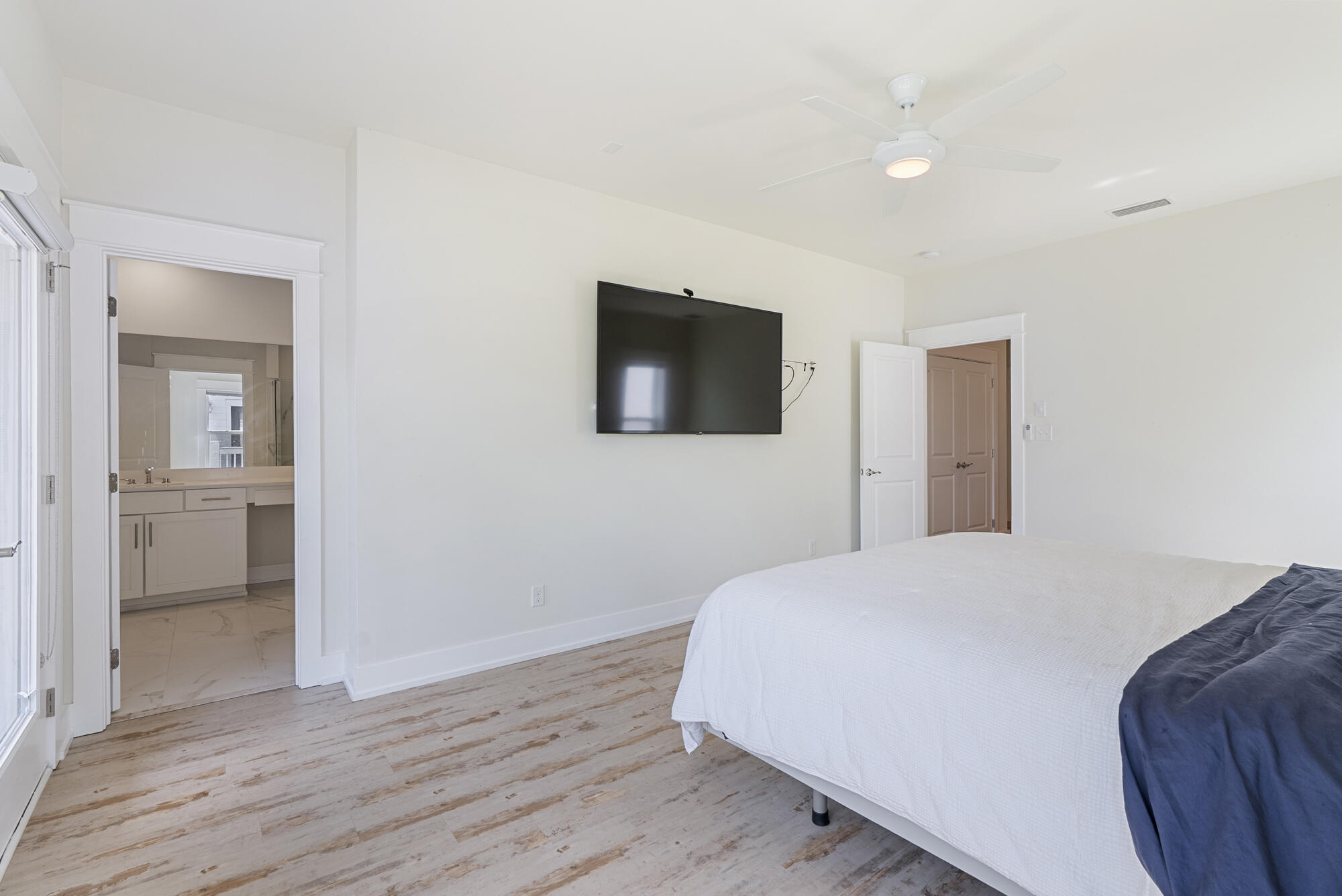 79 Beach View Drive Inlet Beach, FL 32461 - Photo 19 of 41 a bedroom with a bed and a hallway