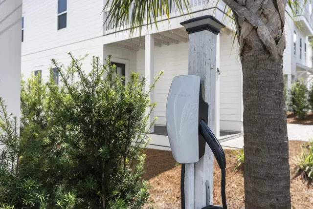 a view of a house with a tree