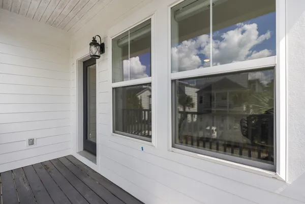 a view of a door of the house and window