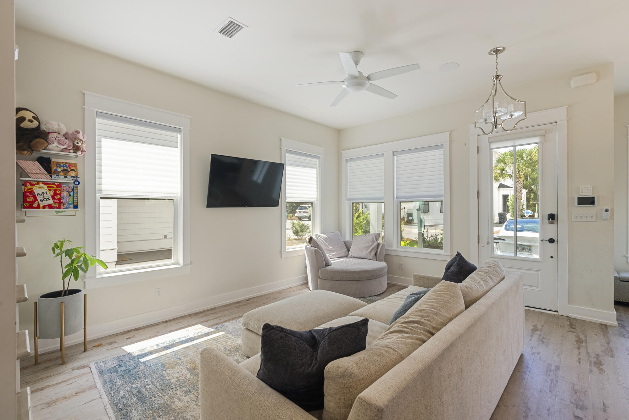79 Beach View Drive Inlet Beach, FL 32461 - Photo 4 of 41 a living room with furniture a ceiling fan and a window
