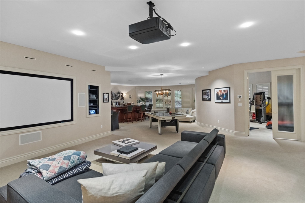 99 Baldpate Hill Road Newton, MA 02459 - Photo 23 of 28 a living room with furniture and wooden floor