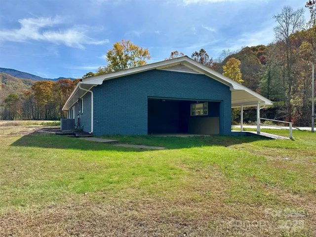 a backyard of a house with lots of green space