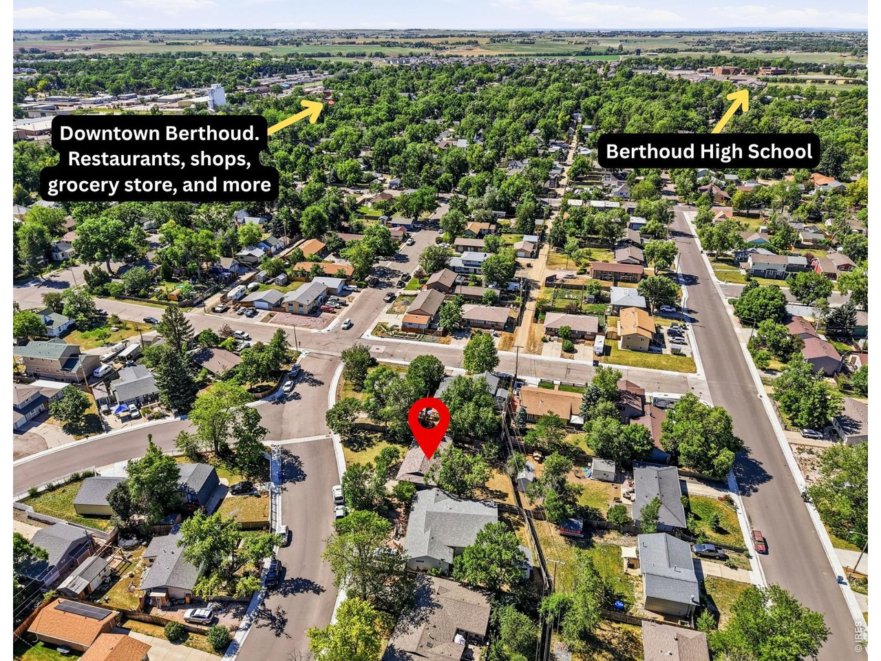 1035 6th Street Berthoud, CO 80513 - Photo 36 of 37 an aerial view of residential houses with outdoor space
