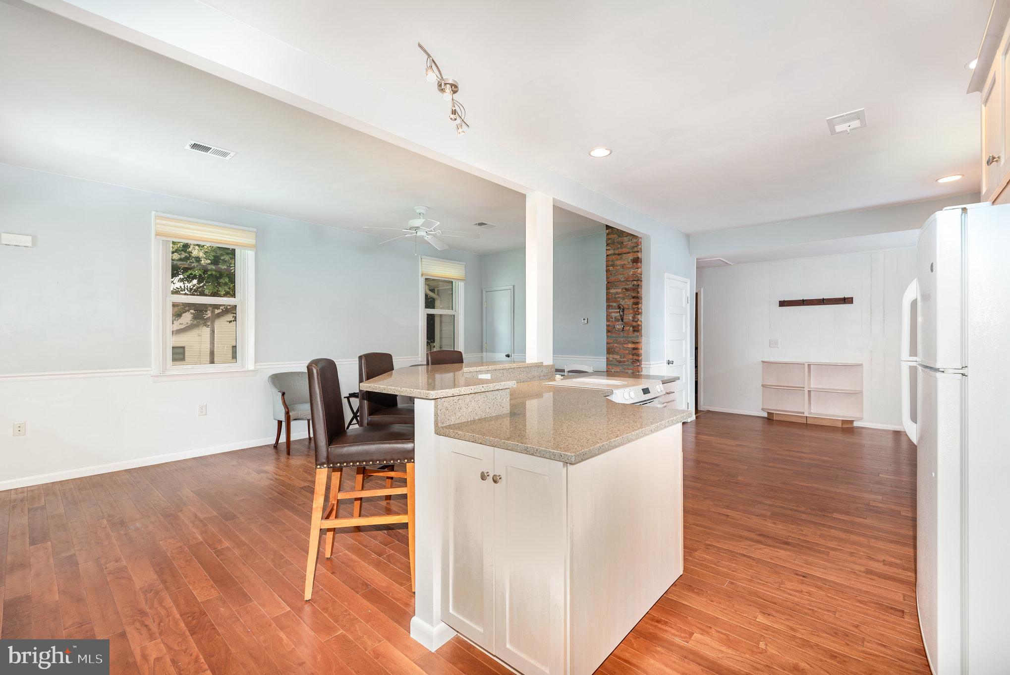 326 Wye Road Baltimore, MD 21221 - Photo 13 of 56 a dining room with furniture and wooden floor