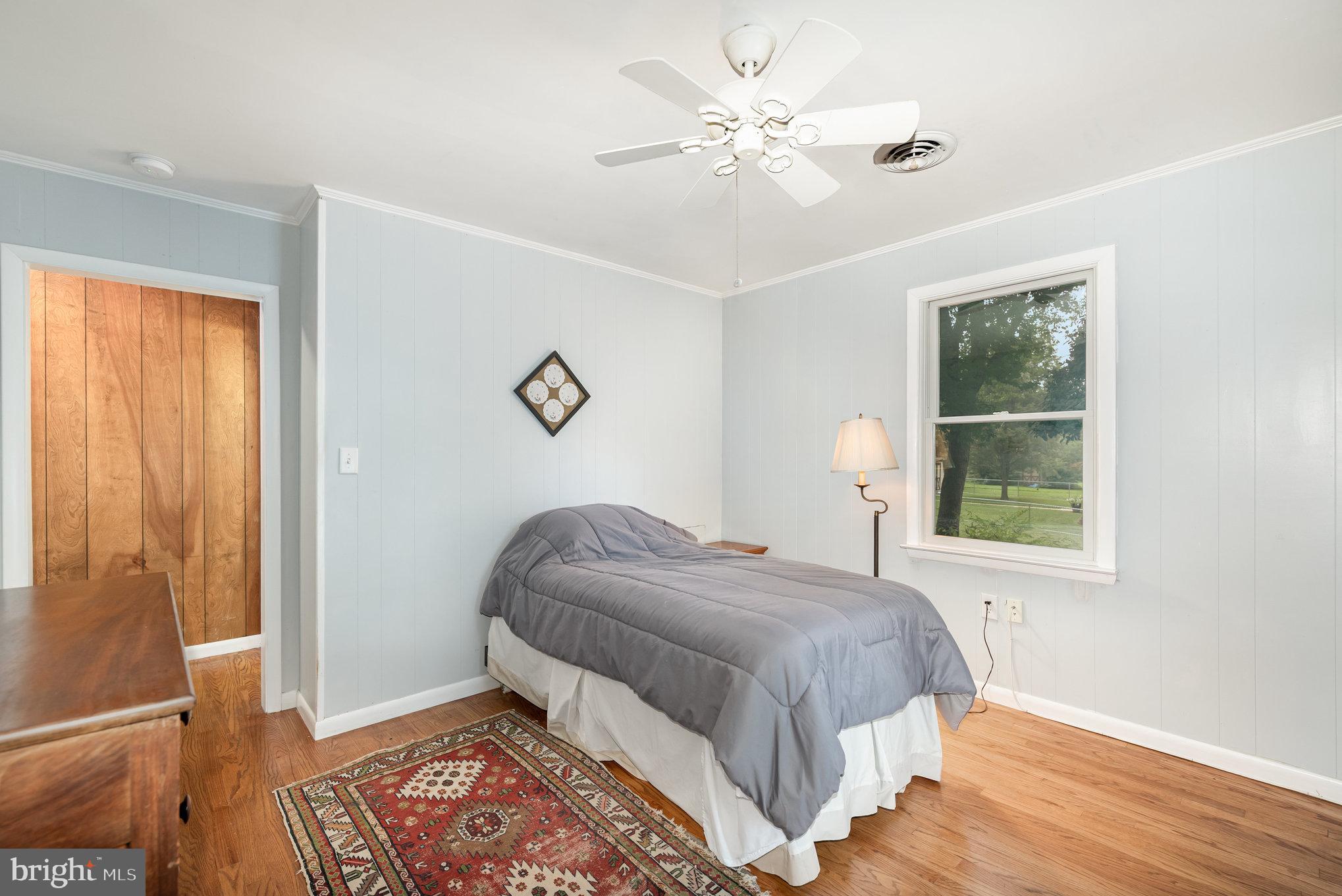 326 Wye Road Baltimore, MD 21221 - Photo 16 of 56 a bedroom with a bed and a window