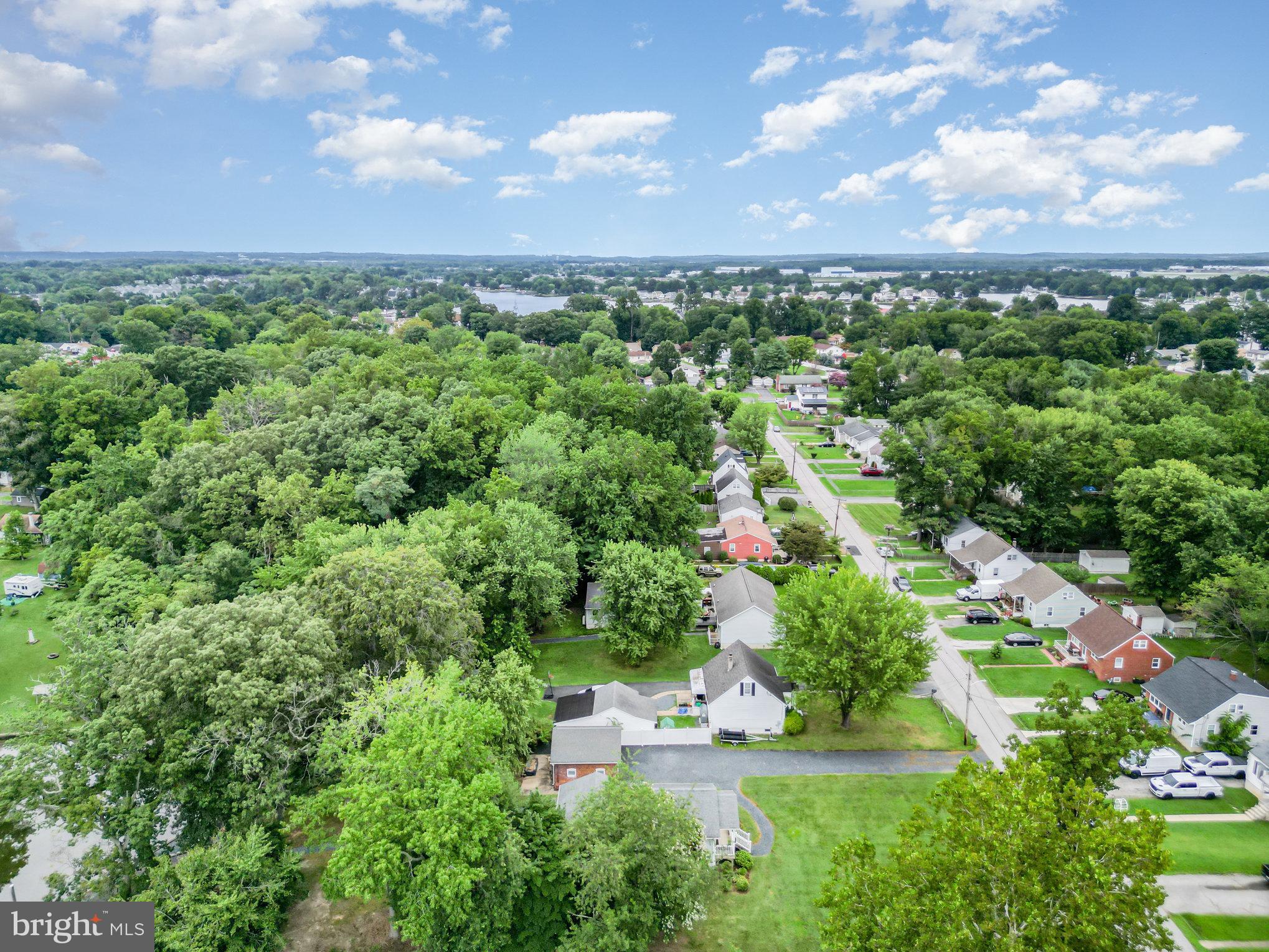 326 Wye Road Baltimore, MD 21221 - Photo 22 of 56 an aerial view of residential houses with outdoor space and trees