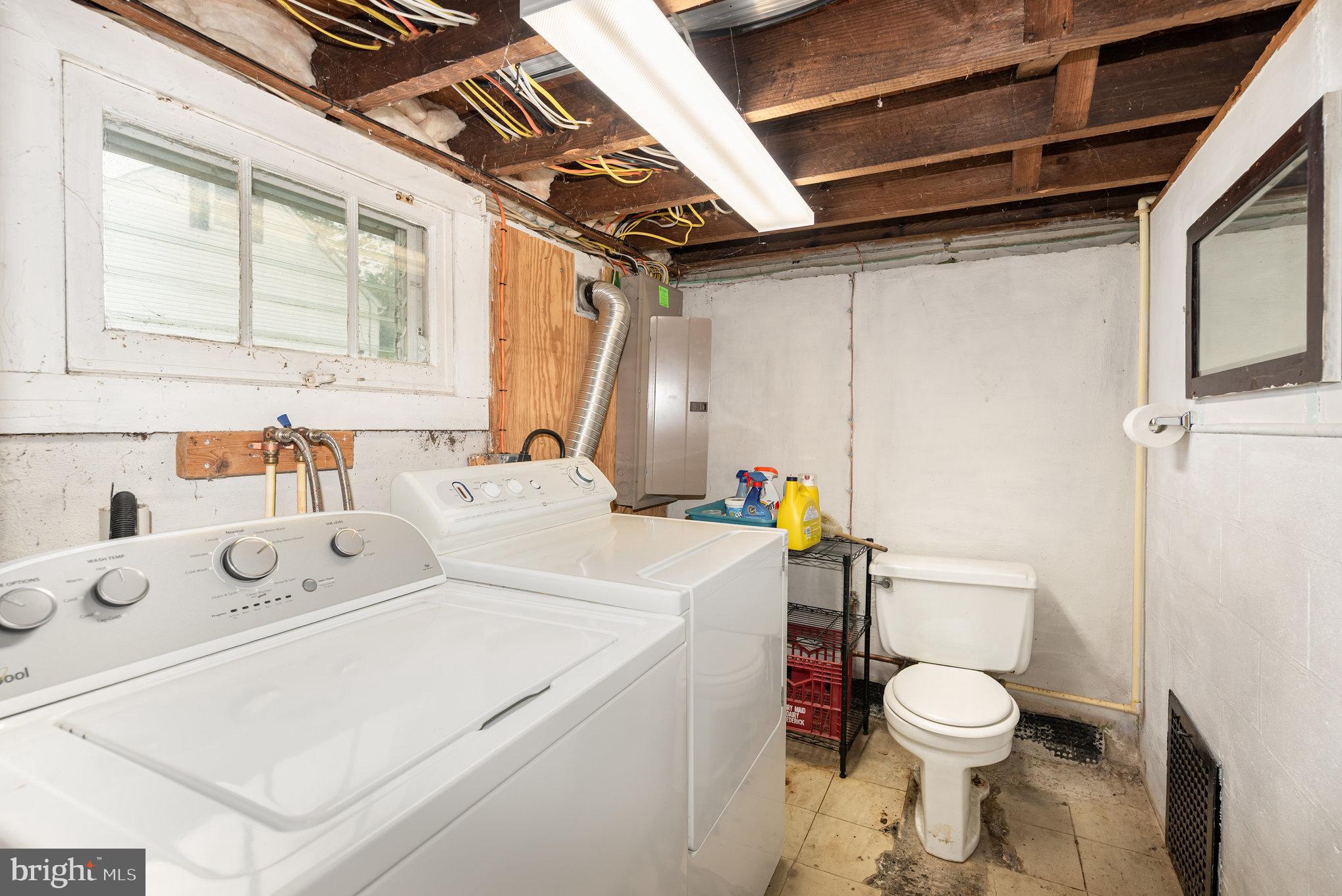 326 Wye Road Baltimore, MD 21221 - Photo 24 of 56 a white toilet sitting next to a bathroom sink