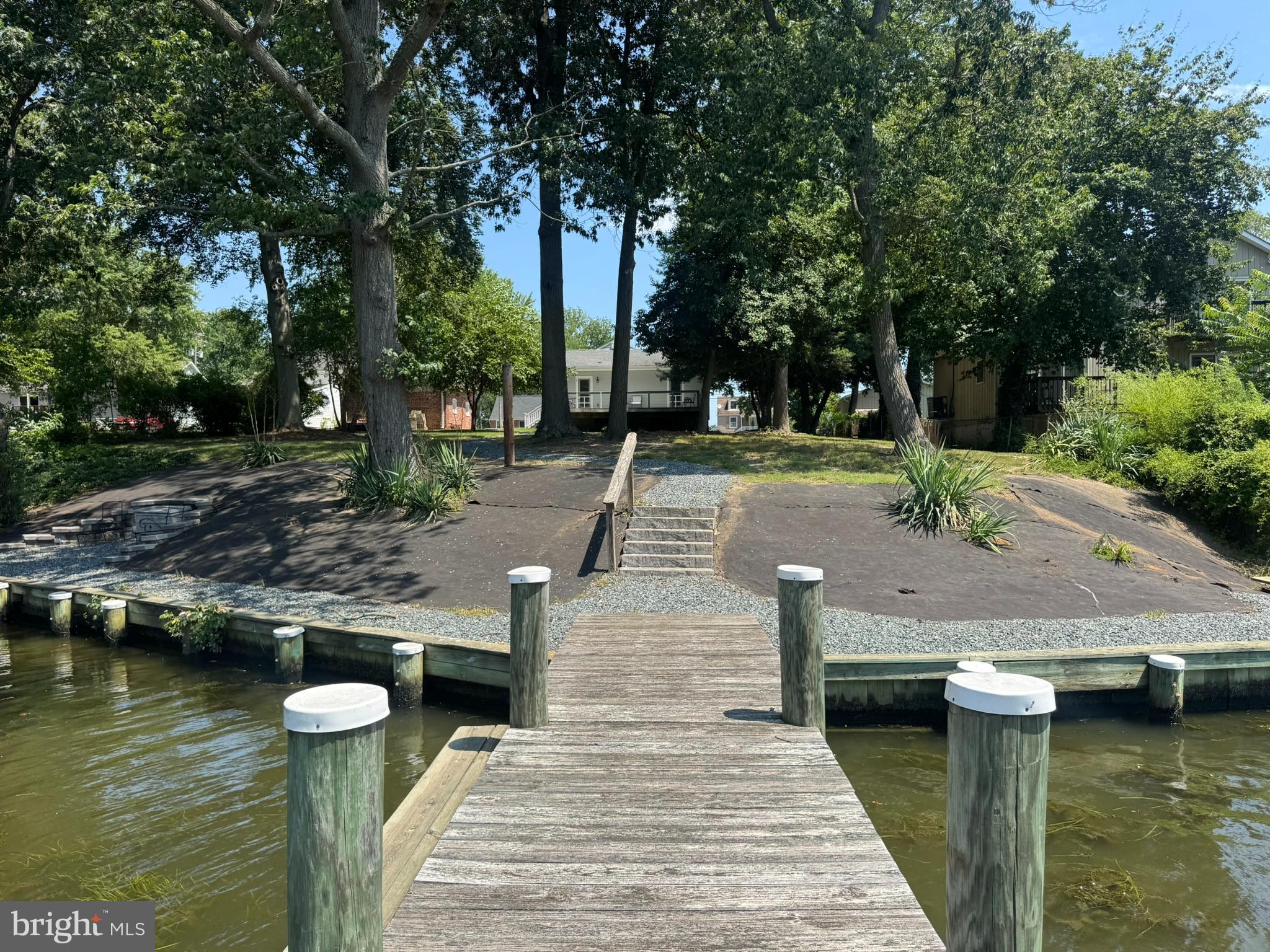 326 Wye Road Baltimore, MD 21221 - Photo 36 of 56 a view of a wooden deck and lake view