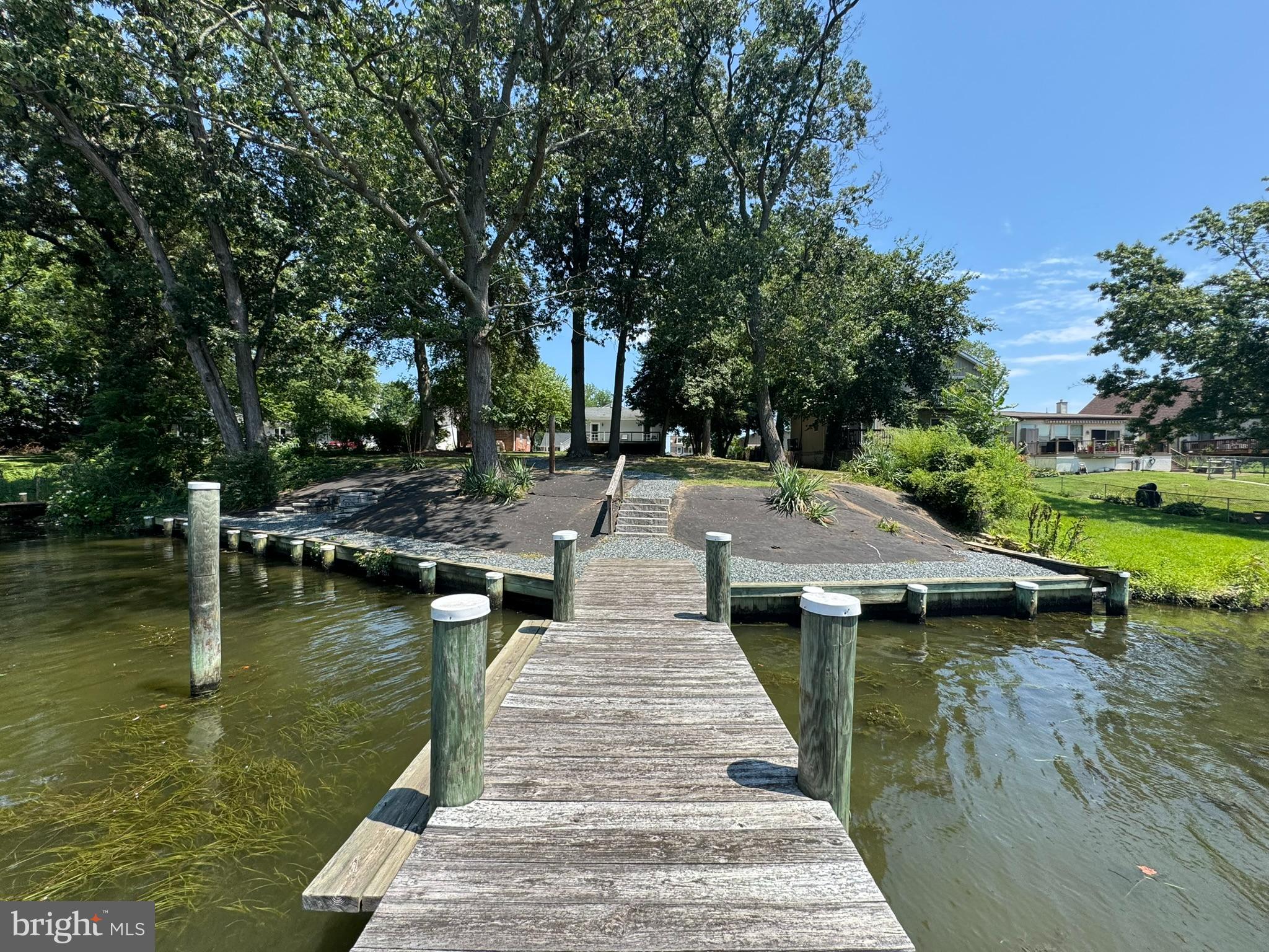 326 Wye Road Baltimore, MD 21221 - Photo 41 of 56 a view of a lake with boats and trees around