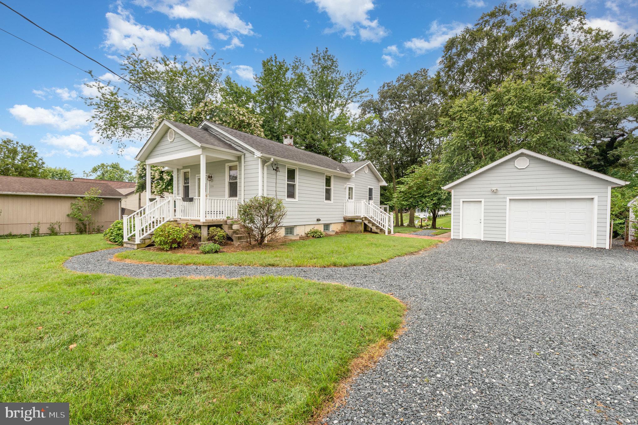 326 Wye Road Baltimore, MD 21221 - Photo 5 of 56 a front view of house with yard and green space