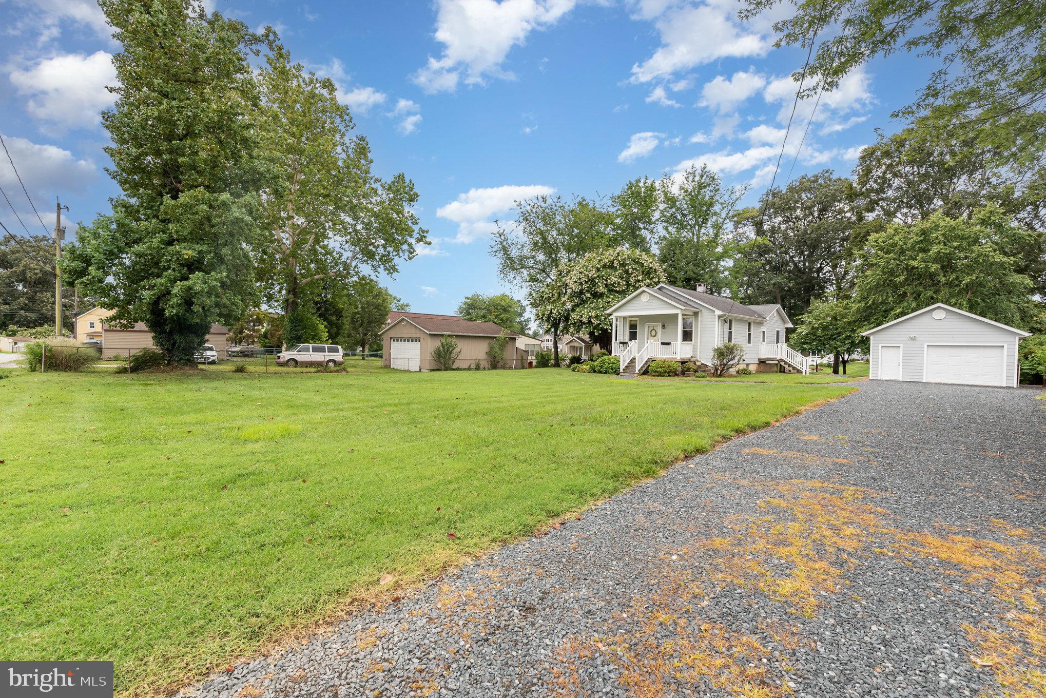 326 Wye Road Baltimore, MD 21221 - Photo 51 of 56 a view of white house with yard and garage
