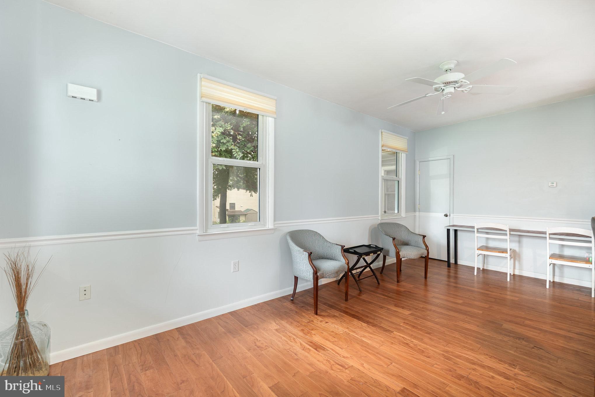 326 Wye Road Baltimore, MD 21221 - Photo 8 of 56 a view of a dining room with furniture and wooden floor