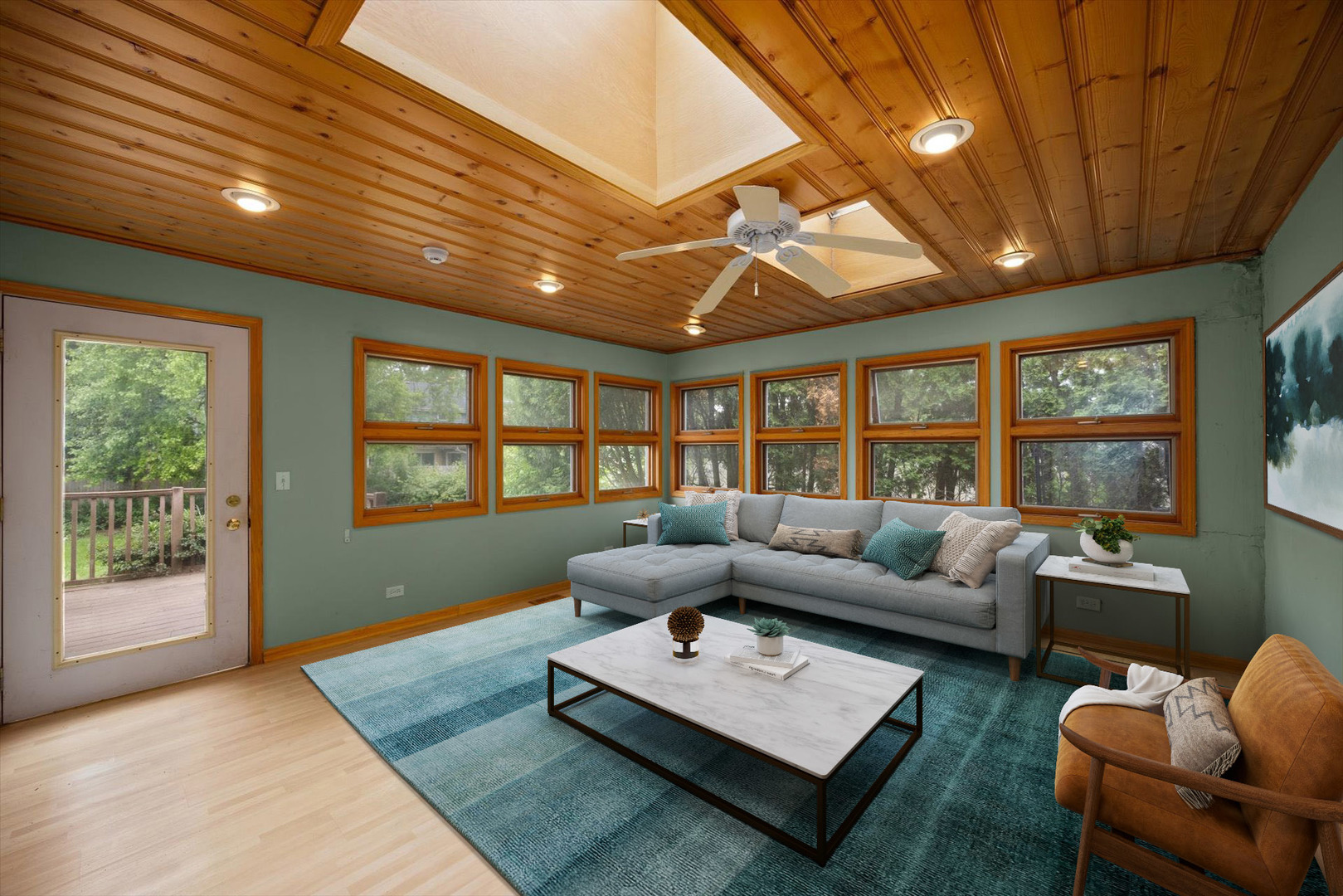 1325 East Lake Avenue Glenview, IL 60025 - Photo 19 of 43 a living room with furniture a ceiling fan and a window