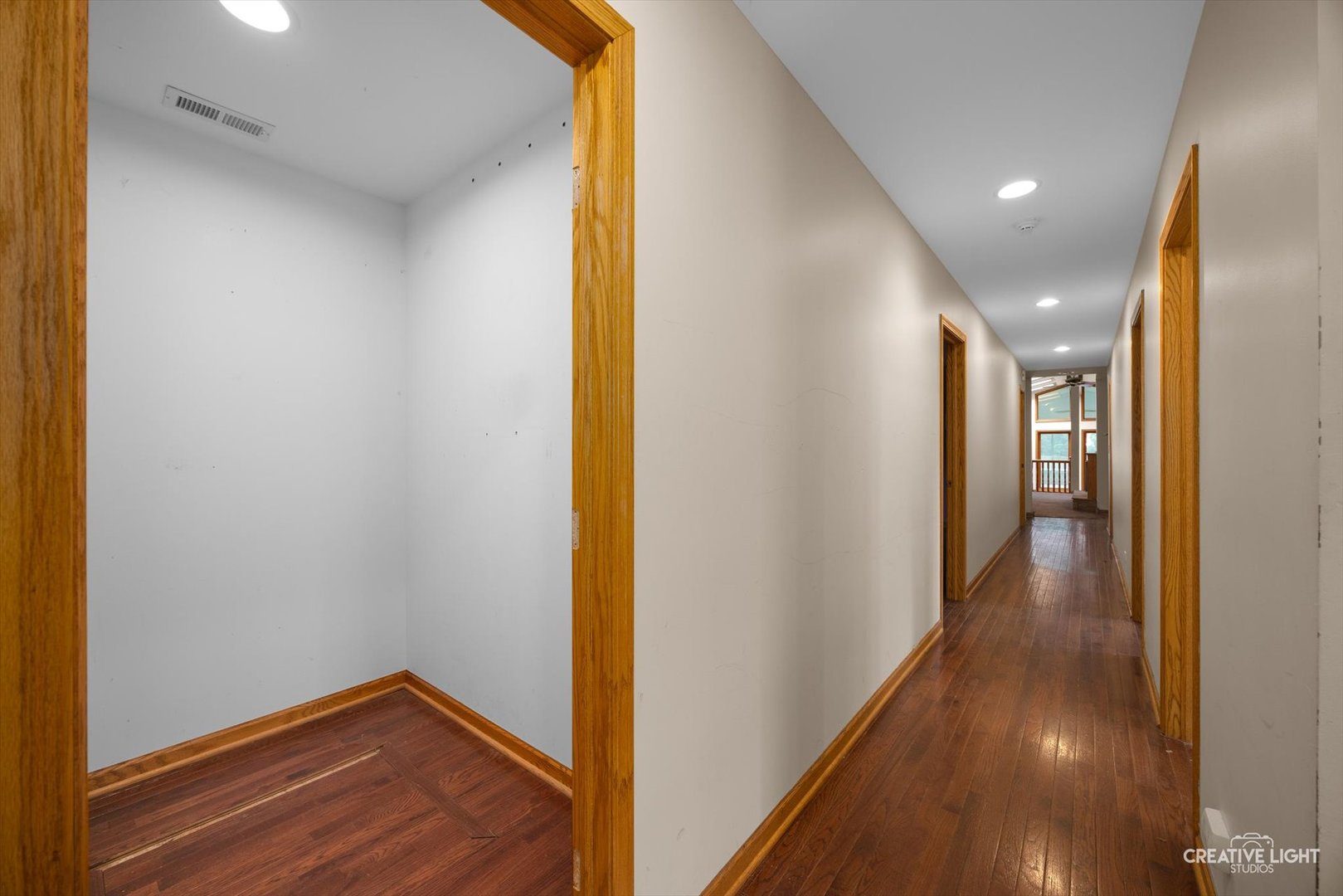 1325 East Lake Avenue Glenview, IL 60025 - Photo 21 of 43 a view of a hallway with wooden floor