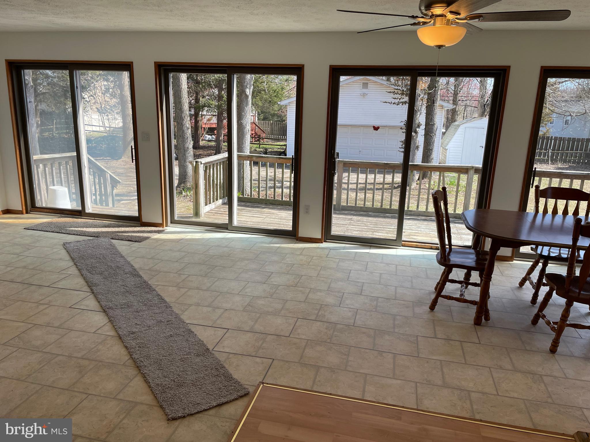 13105 Choptank Road Middle River, MD 21220 - Photo 27 of 47 Family Room Sliding Glass Doors to the Deck