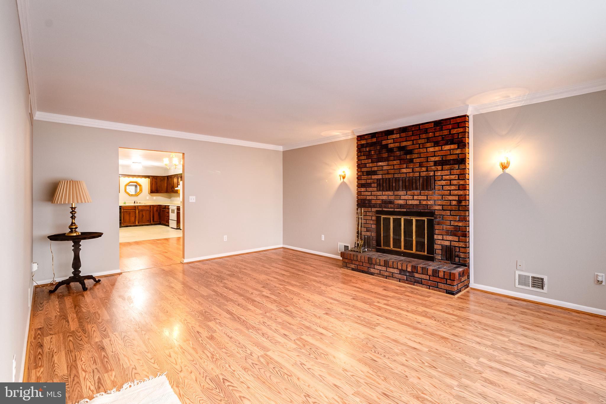 13105 Choptank Road Middle River, MD 21220 - Photo 3 of 47 Living Room with Brick Fireplace