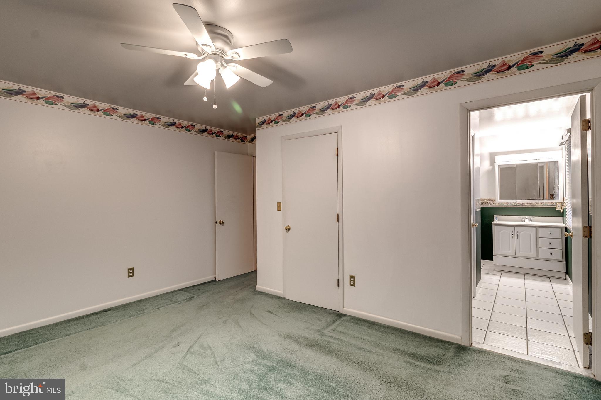 13105 Choptank Road Middle River, MD 21220 - Photo 5 of 47 Primary Bedroom w/ Full Bath