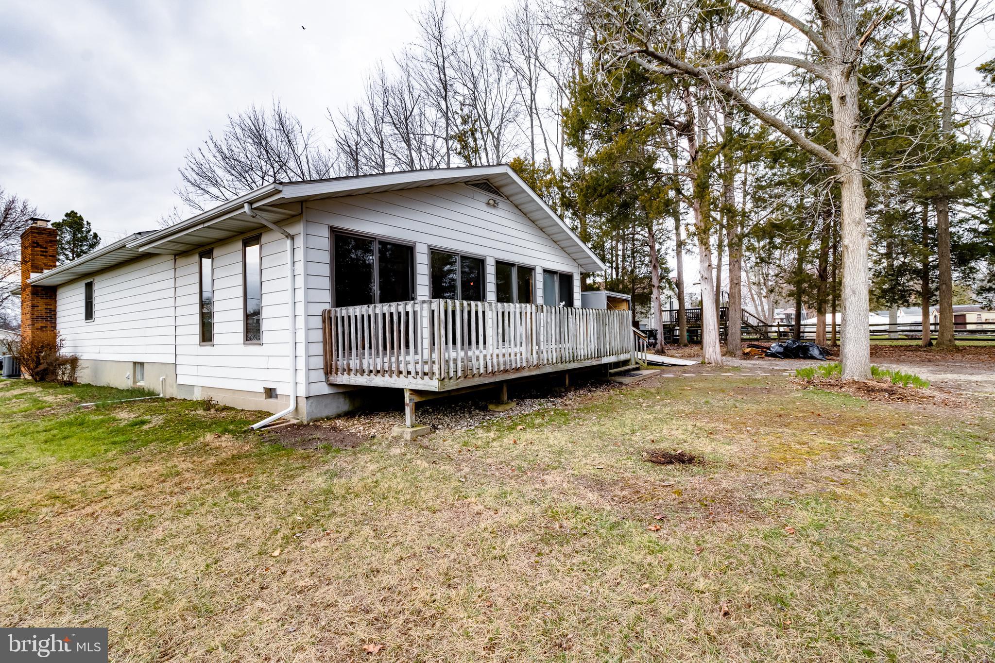 13105 Choptank Road Middle River, MD 21220 - Photo 6 of 47 Rear Photo- Deck off of the Sun Room