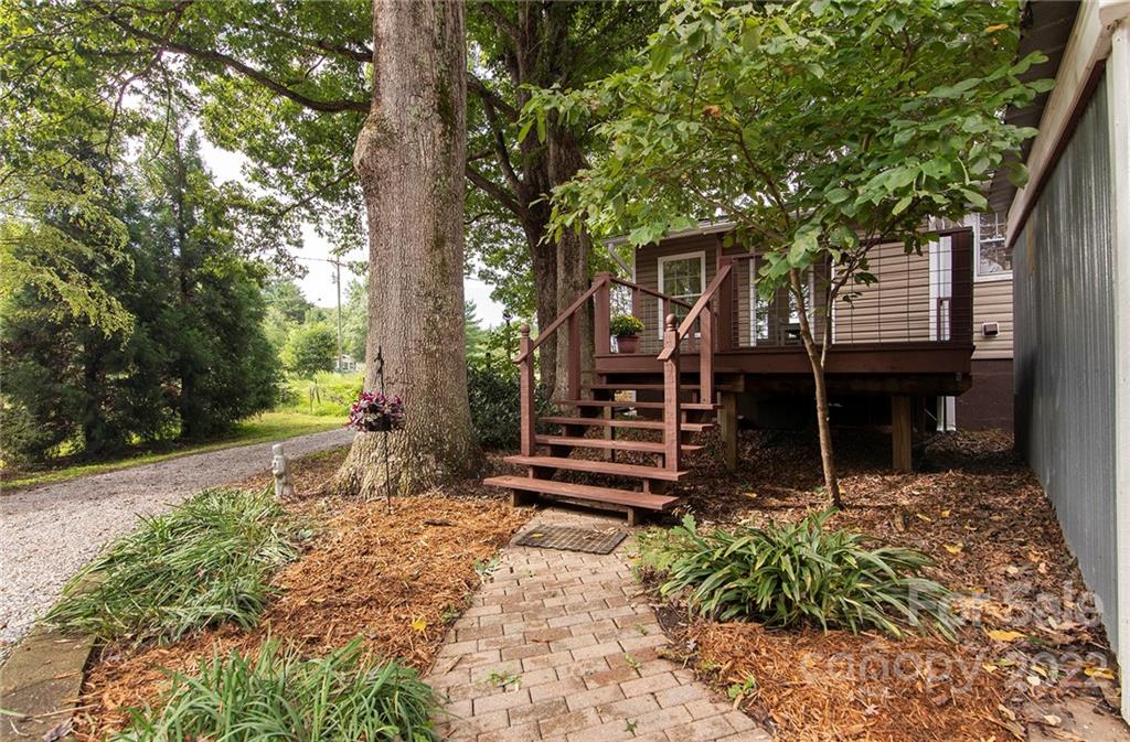 3006 Mack Ballard Road Maiden, NC 28650 - Photo 29 of 44 a front view of a house with garden