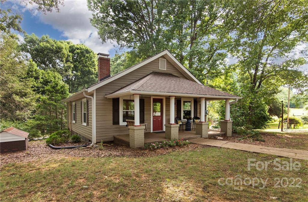 3006 Mack Ballard Road Maiden, NC 28650 - Photo 39 of 44 a front view of a house with garden