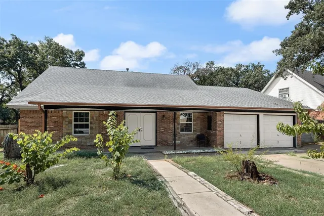 front view of house with a yard