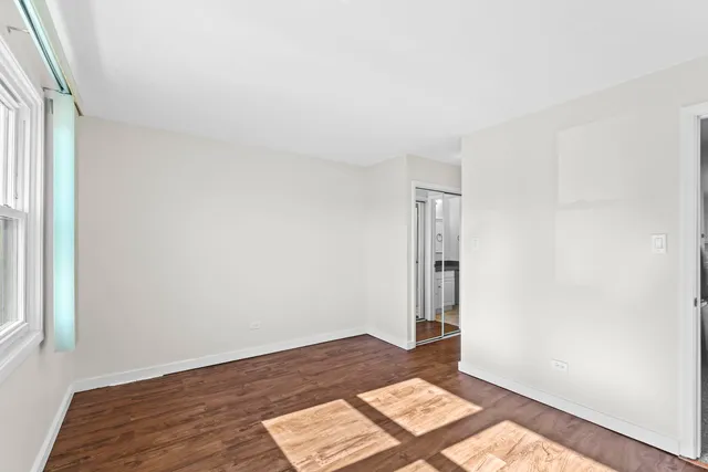 a view of an empty room and window