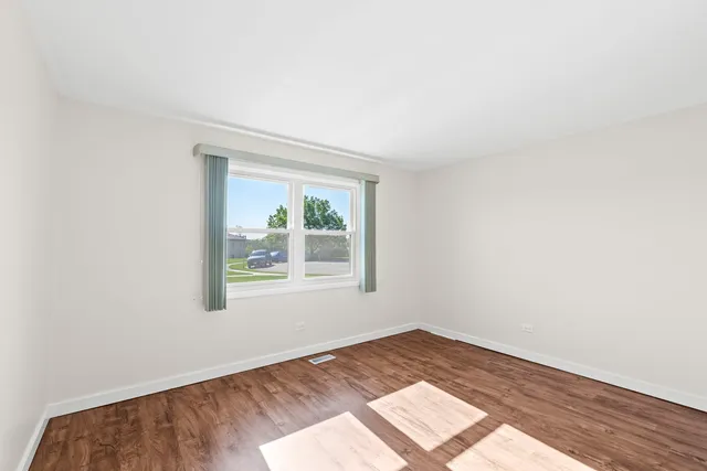 an empty room with a window